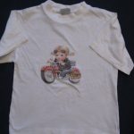 AMERICAN T-SHIRT PRINTED WITH USA MOTIVE " GIRL DRIVING MOTOR CYCLE " LOWEST PRICE GARANTI. Art.No. 17114-6951